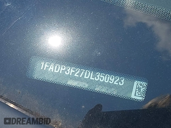 2013 Ford Focus SE z VIN 1FADP3F27DL350923, wystawiony jako IAAI lot #42405976 z przebiegiem 126 730 mil mil oraz . Historia ofert i sprzedaży dostępna na DreamBid. Obrazek 9.