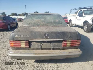 1988 Mercedes-Benz 420 with VIN WDBCA35D5JA388327, listed as a Copart auction lot 74394414 with 299,950 mi miles and Salvage Title. Bid and sale history available at carsss.com. Image 6.