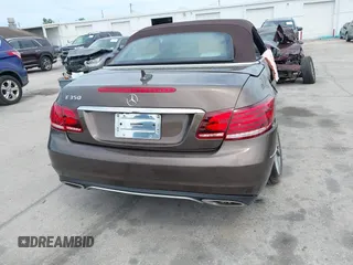 2014 Mercedes-Benz E-Class E 350 with VIN WDDKK5KF9EF242085, listed as a IAAI auction lot 41876938 with 75,760 mi miles. Bid and sale history available at carsss.com. Image 16.