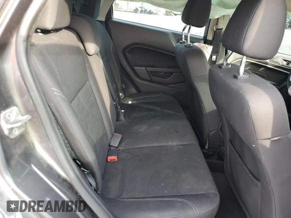 2019 Ford Fiesta SE z VIN 3FADP4EJ4KM115566, wystawiony jako Copart lot #55336615 z przebiegiem 202 912 mil mil oraz Szkoda całkowita • Salvage title. Historia ofert i sprzedaży dostępna na DreamBid. Obrazek 10.
