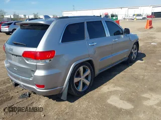 2014 Jeep Grand Cherokee Overland with VIN 1C4RJFCT9EC231840, listed as a IAAI auction lot 42114284 with 170,691 mi miles and . Bid and sale history available at DreamBid. Image 4.