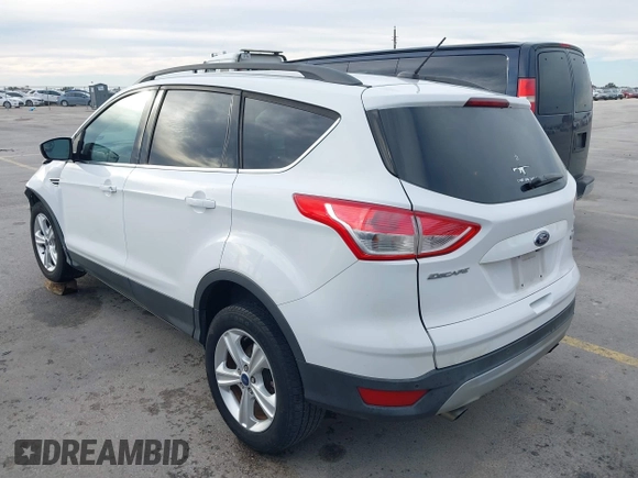 2015 Ford Escape SE with VIN 1FMCU0GX2FUB33893, listed as a IAAI auction lot 41455605 with 128,383 mi miles. Bid and sale history available at carsss.com. Image 3.