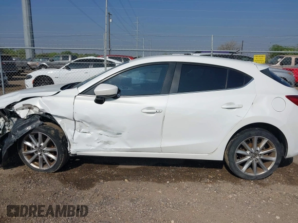 2017 Mazda 3 Touring with VIN 3MZBN1L77HM157118, listed as a IAAI auction lot 41734627 with 132,452 mi miles and . Bid and sale history available at DreamBid. Image 14.