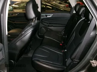 2020 Ford Edge Titanium with VIN 2FMPK4K98LBB37763, listed as a IAAI auction lot 42137065 with 83,033 mi miles. Bid and sale history available at carsss.com. Image 1.