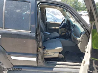 2006 Jeep Liberty Sport with VIN 1J4GK48K46W246801, listed as a IAAI auction lot 42048509 with 219,077 mi miles. Bid and sale history available at carsss.com. Image 5.