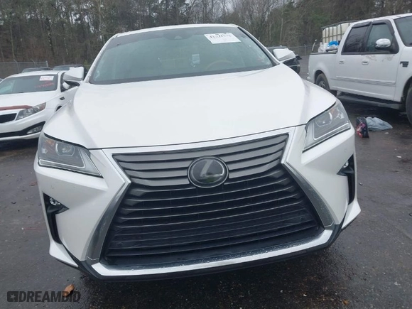2017 Lexus RX with VIN 2T2BZMCA6HC077656, listed as a IAAI auction lot 41394175 with 80,986 mi miles. Bid and sale history available at carsss.com. Image 13.