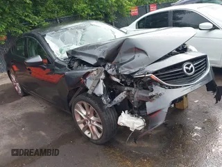 2015 Mazda 6 i Touring with VIN JM1GJ1V61F1167176, listed as a IAAI auction lot 42514767 with 119,686 mi miles and . Bid and sale history available at DreamBid. Image 1.