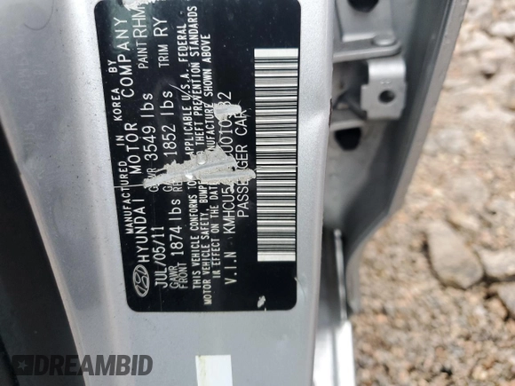 2012 Hyundai Accent SE z VIN KMHCU5AE2CU010532, wystawiony jako Copart lot #49165705 z przebiegiem Nie podano mil oraz Szkoda całkowita • Salvage title. Historia ofert i sprzedaży dostępna na DreamBid. Obrazek 12.
