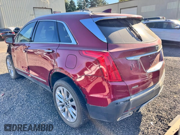 2019 Cadillac XT5 Premium Luxury AWD with VIN 1GYKNFRS2KZ251595, listed as a Copart auction lot 65834135 with 23,925 mi miles and Salvage title. Bid and sale history available at DreamBid. Image 3.