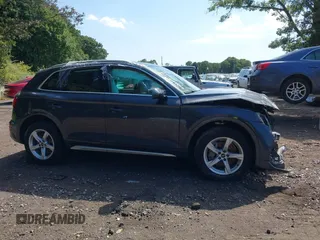 2021 Audi Q5 Premium with VIN WA1AAAFY8M2119097, listed as a IAAI auction lot 40308722 with 57,666 mi miles. Bid and sale history available at carsss.com. Image 12.