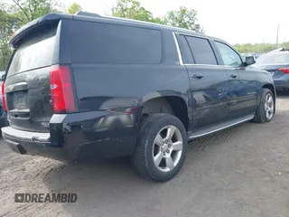2015 Chevrolet Suburban LTZ with VIN 1GNSKKKC6FR637086, listed as a IAAI auction lot 42104826 with 79,986 mi miles and . Bid and sale history available at DreamBid. Image 4.
