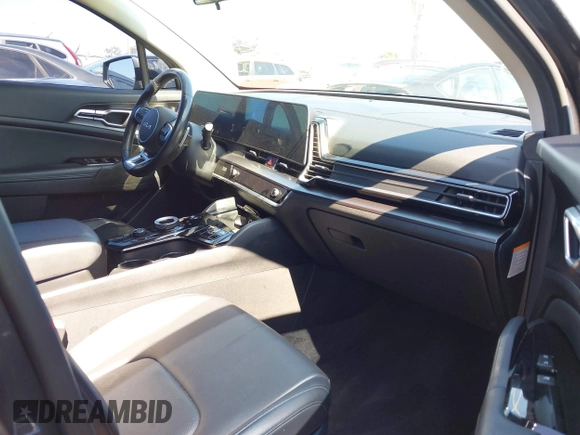 2023 Kia Sportage EX with VIN KNDPVCAG8P7019572, listed as a IAAI auction lot 42226335 with 68,583 mi miles and . Bid and sale history available at DreamBid. Image 5.