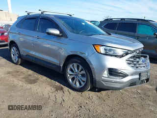 2020 Ford Edge Titanium z VIN 2FMPK4K96LBA00515, wystawiony jako IAAI lot #41757974 z przebiegiem 76 242 mil mil oraz . Historia ofert i sprzedaży dostępna na DreamBid. Obrazek 1.