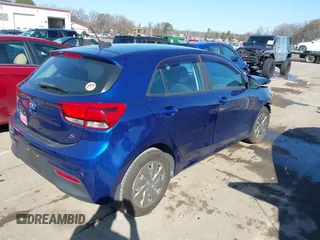 2019 Kia Rio S with VIN 3KPA25AB0KE209857, listed as a IAAI auction lot 41529245 with 71,212 mi miles and . Bid and sale history available at DreamBid. Image 4.