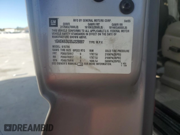 2005 GMC Yukon Denali z VIN 1GKEK63U35J228887, wystawiony jako Copart lot #68141304 z przebiegiem 238 024 mil mil oraz Szkoda całkowita • Salvage title. Historia ofert i sprzedaży dostępna na DreamBid. Obrazek 13.