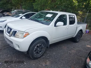 2015 Nissan Frontier S with VIN 1N6AD0EV0FN717018, listed as a IAAI auction lot 42322428 with 104,715 mi miles and . Bid and sale history available at DreamBid. Image 2.