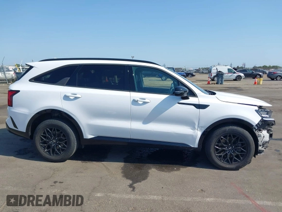 2022 Kia Sorento EX with VIN 5XYRH4LFXNG088838, listed as a IAAI auction lot 42429064 with 62,808 mi miles and . Bid and sale history available at DreamBid. Image 14.
