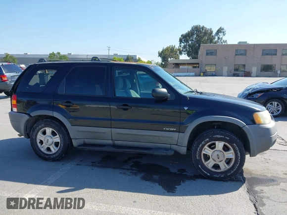 2002 Ford Escape XLT with VIN 1FMCU03142KC39723, listed as a IAAI auction lot 42228038 with 131,399 mi miles and . Bid and sale history available at DreamBid. Image 14.