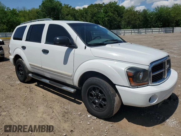 2006 Dodge Durango Limited with VIN 1D4HB58266F122905, listed as a Copart auction lot 54677775 with 238,981 mi miles and Salvage title. Bid and sale history available at DreamBid. Image 4.