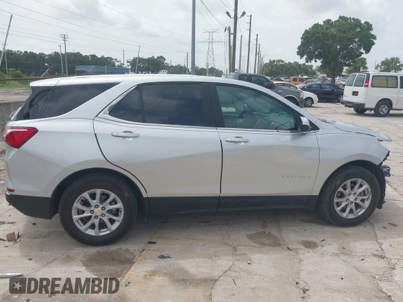 2021 Chevrolet Equinox LT z VIN 3GNAXKEV0MS165682, wystawiony jako IAAI lot #42419436 z przebiegiem 42 199 mil mil oraz . Historia ofert i sprzedaży dostępna na DreamBid. Obrazek 14.