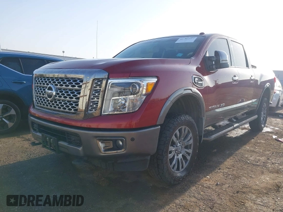 2017 Nissan Titan Pro-4X z VIN 1N6BA1F43HN562377, wystawiony jako IAAI lot #41786607 z przebiegiem 95 207 mil mil oraz . Historia ofert i sprzedaży dostępna na DreamBid. Obrazek 19.
