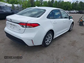 2023 Toyota Corolla LE with VIN 5YFB4MDE7PP068547, listed as a IAAI auction lot 42158965 with 48,735 mi miles. Bid and sale history available at carsss.com. Image 4.