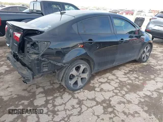 2013 Kia Rio EX with VIN KNADN4A33D6206917, listed as a IAAI auction lot 41049490 with 188,281 mi miles and . Bid and sale history available at DreamBid. Image 4.