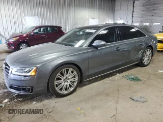 2015 Audi A8 3.0T z VIN WAU3GAFD4FN000925, wystawiony jako Copart lot #56969755 z przebiegiem 53 808 mil mil oraz Czysty tytuł • Clean title. Historia ofert i sprzedaży dostępna na DreamBid. Obrazek 1.