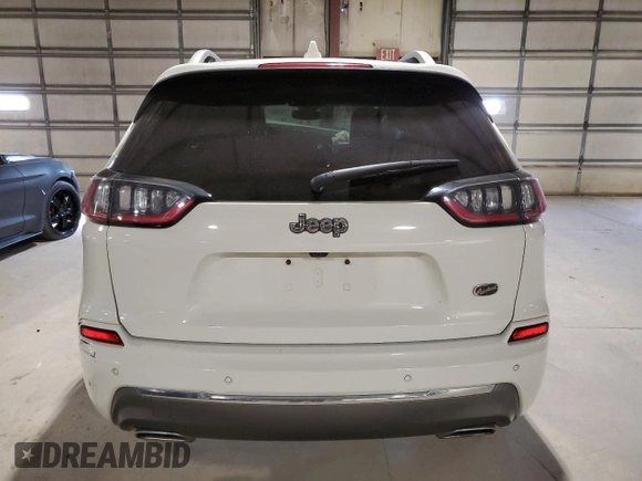 2019 Jeep Cherokee with VIN 1C4PJLJN4KD208014, listed as a Copart auction lot 73403614 with 16,863 mi miles and Salvage title. Bid and sale history available at DreamBid. Image 6.