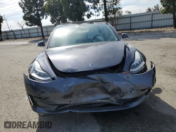 2019 Tesla Model 3 Mid Range with VIN 5YJ3E1EA0KF445185, listed as a Copart auction lot 48630675 with 76,351 mi miles and Salvage Title. Bid and sale history available at carsss.com. Image 5.