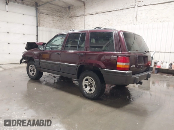 1995 Jeep Grand Cherokee Laredo with VIN 1J4GZ58S2SC679918, listed as a IAAI auction lot 41840415 with 261,434 mi miles. Bid and sale history available at carsss.com. Image 3.