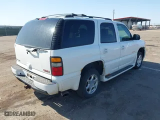 2004 GMC Yukon Denali with VIN 1GKEK63U54J251781, listed as a IAAI auction lot 42099768 with 166,543 mi miles. Bid and sale history available at carsss.com. Image 4.
