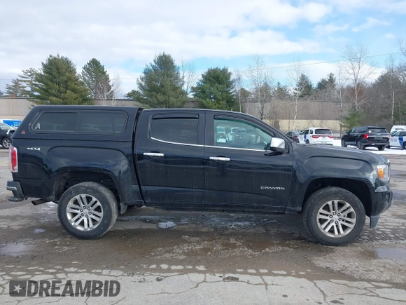 2015 GMC Canyon 4WD SLT with VIN 1GTG6CE39F1238269, listed as a IAAI auction lot 41327897 with 155,663 mi miles. Bid and sale history available at carsss.com. Image 13.