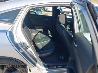 2019 Honda Civic Sport with VIN 2HGFC2F8XKH602463, listed as a IAAI auction lot 41966052 with 95,416 mi miles and . Bid and sale history available at DreamBid. Image 8.