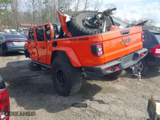 2020 Jeep Gladiator Rubicon with VIN 1C6JJTBG0LL164890, listed as a IAAI auction lot 41795545 with 77,860 mi miles. Bid and sale history available at carsss.com. Image 3.