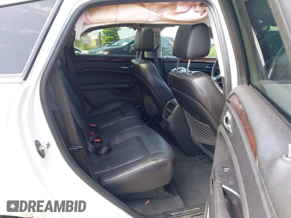 2013 Cadillac SRX Performance Collection with VIN 3GYFNHE3XDS520177, listed as a IAAI auction lot 42536457 with 217,963 mi miles and . Bid and sale history available at DreamBid. Image 8.