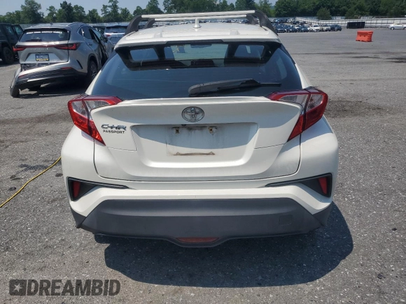 2018 Toyota C-HR XLE with VIN NMTKHMBX6JR027395, listed as a Copart auction lot 63071605 with 124,293 mi miles and Clean title. Bid and sale history available at DreamBid. Image 6.