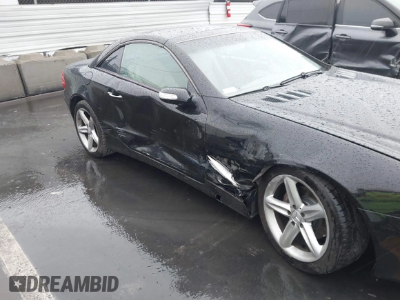 2004 Mercedes-Benz SL 500 with VIN WDBSK75F34F079139, listed as a IAAI auction lot 41778245 with 67,746 mi miles and . Bid and sale history available at DreamBid. Image 6.