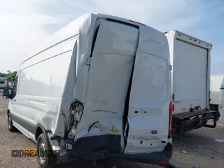 2016 Ford Transit Cargo z VIN 1FTYR3XM6GKB25327, wystawiony jako IAAI lot #42468273 z przebiegiem 137 976 mil mil oraz . Historia ofert i sprzedaży dostępna na DreamBid. Obrazek 6.