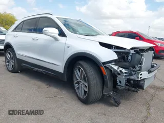 2022 Cadillac XT4 FWD Sport with VIN 1GYFZER44NF164899, listed as a IAAI auction lot 42152554 with 8,058 mi miles and . Bid and sale history available at carsss.com. Image 1.