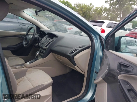 2012 Ford Focus SE with VIN 1FAHP3F29CL464650, listed as a IAAI auction lot 42495994 with 142,336 mi miles and . Bid and sale history available at DreamBid. Image 5.