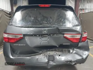 2012 Honda Odyssey Touring с VIN 5FNRL5H99CB047340, выставлен на аукционе IAAI как лот 41965189 с пробегом Не указан миль и . История ставок и продаж доступна на DreamBid. Изображение 16.