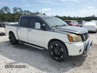 2004 Nissan Titan LE with VIN 1N6AA07A44N580326, listed as a Copart auction lot 53446825 with 236,618 mi miles and Salvage title. Bid and sale history available at DreamBid. Image 4.