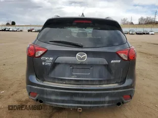 2016 Mazda CX-5 Grand Touring z VIN JM3KE4DY0G0633861, wystawiony jako Copart lot #47748645 z przebiegiem 112 219 mil mil oraz Szkoda całkowita • Salvage title. Historia ofert i sprzedaży dostępna na DreamBid. Obrazek 6.