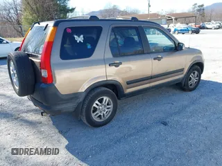 2002 Honda CR-V EX with VIN JHLRD78842C059829, listed as a IAAI auction lot 41687910 with 303,313 mi miles. Bid and sale history available at carsss.com. Image 4.
