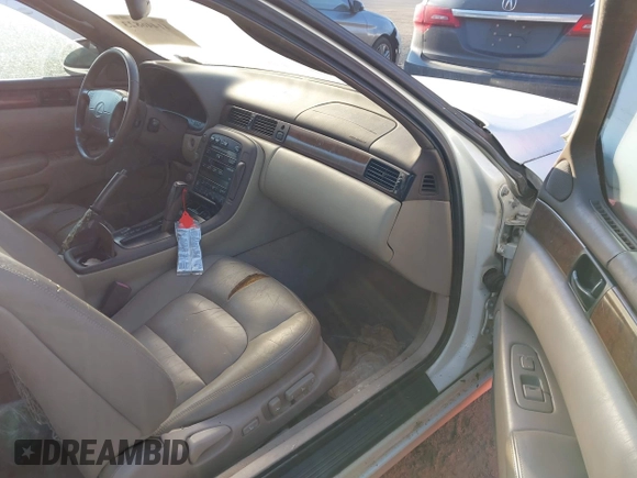 1997 Lexus SC 300 with VIN JT8CD32Z4V0040389, listed as a IAAI auction lot 41446823 with Not provided miles and . Bid and sale history available at DreamBid. Image 5.