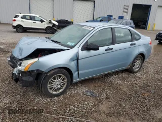 2009 Ford Focus SE z VIN 1FAHP35NX9W235719, wystawiony jako Copart lot #55658595 z przebiegiem 215 372 mil mil oraz Szkoda całkowita • Salvage title. Historia ofert i sprzedaży dostępna na DreamBid. Obrazek 1.
