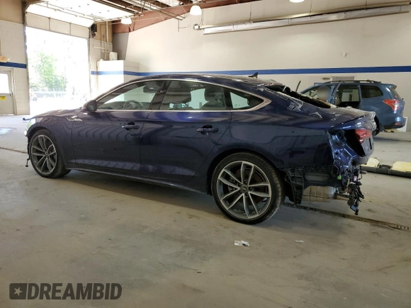 2023 Audi A5 Sportback S line Premium Plus with VIN WAUFACF58PA029856, listed as a Copart auction lot 54947985 with 4,921 mi miles and Salvage Title. Bid and sale history available at carsss.com. Image 2.