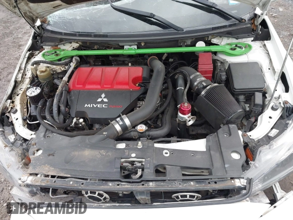 2014 Mitsubishi Lancer Evolution GSR with VIN JA32W8FV5EU012572, listed as a IAAI auction lot 40871463 with 89,529 mi miles. Bid and sale history available at carsss.com. Image 10.