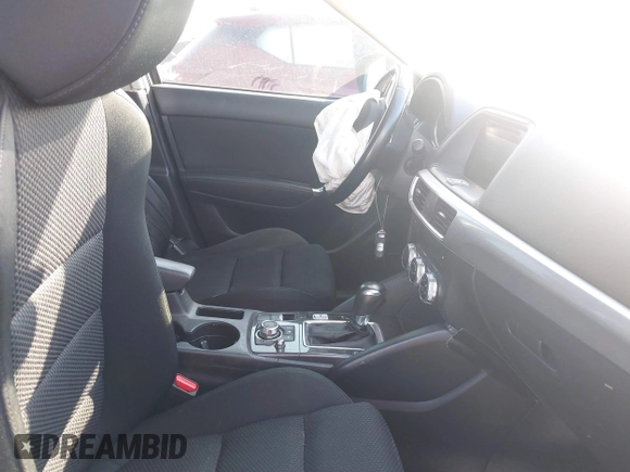 2016 Mazda CX-5 Touring with VIN JM3KE2CY6G0808992, listed as a IAAI auction lot 40969655 with 132,513 mi miles. Bid and sale history available at carsss.com. Image 5.